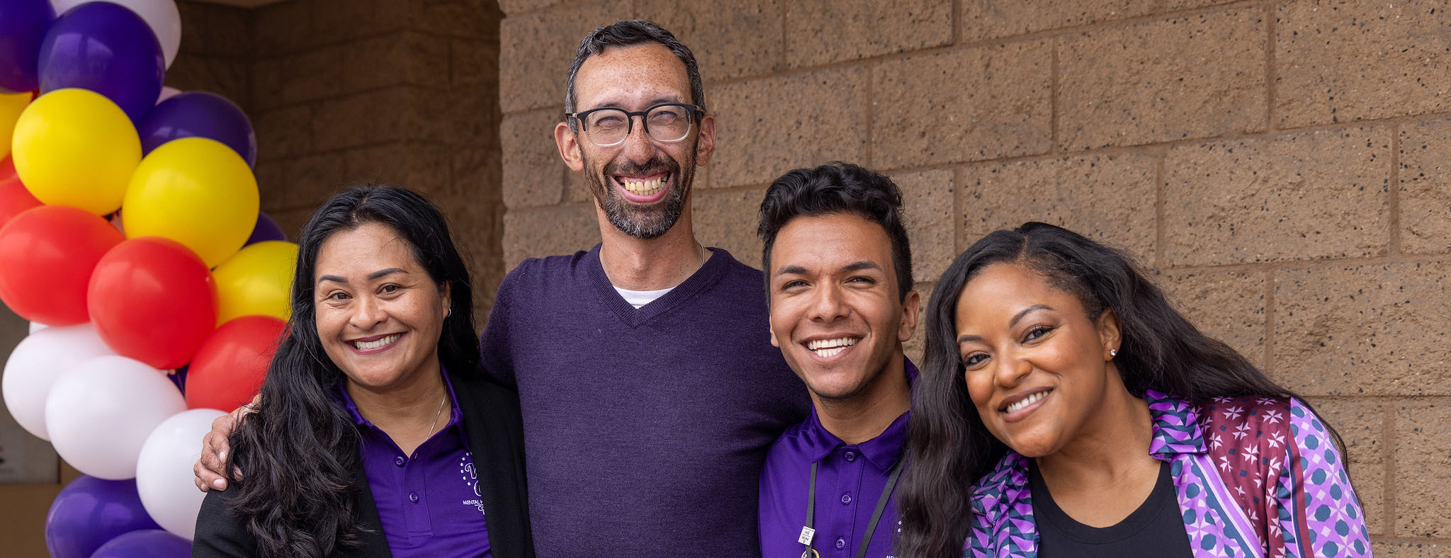 SDCCE Faculty smiling for picture outside