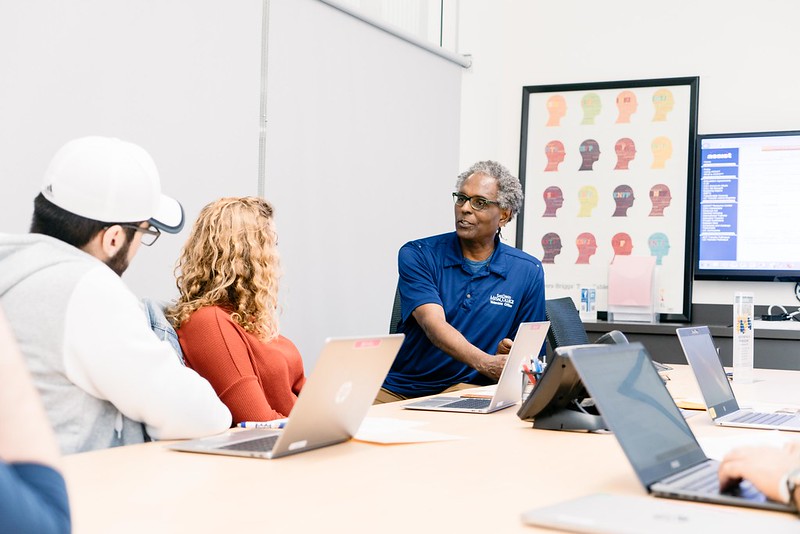 Counselor helping students