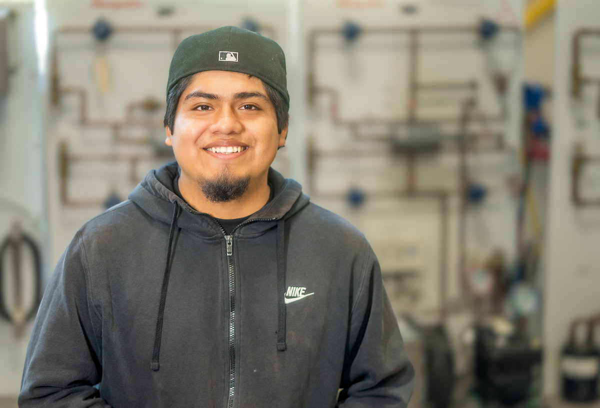 Kevin Morales, a student enrolled in the Heating, Ventilation, and Air Conditioning (HVAC) program.